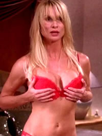 Nicollette Sheridan paparazzi bikini shots and topless movie caps