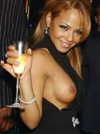 Christina Milian shows her tight ass on stage