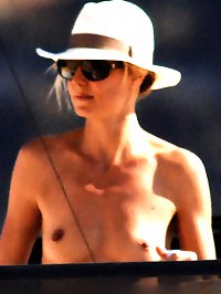 Heidi Klum lays out topless on expensive yacht