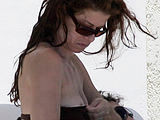 Debra Messing Paparazzi Nipple Shots