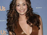 Emmy Rossum Looks Stunning In Gold Dress