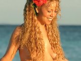 Mariah Carey topless walking through water