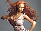 Tyra Banks Short Dress & Bikini Posing Gallery
