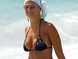 Federica Fontana caught on vacation all wet in a skimpy bikini