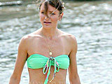 Cameron Diaz looks so sexy in a little bikini near of river candids