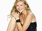 Kirsten Dunst showing off sides of her nude tits and sexy legs shoots