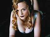 Heather Graham looks so sweet showing deep cleavage and sexy legs