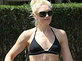 Gwen Stefani caught in a tiny bikini top & sexy photo shoot gallery