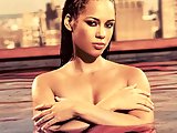 Alicia Keys posing in really sexy dress