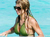 Stacy Ferguson shows her great body and breast in green bikini candids