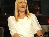 Maria Sharapova flaunting her very sexy long legs in a short dress