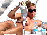 Billie Piper caught tanning topless & glamour