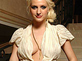 Ashlee Simpson flashing her white panties in a ultra-mini dress