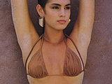Cindy Crawford looking really fantastic posing in a tiny bikini