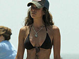 Brooke Burke caught in a sexy bikini on the beach with her family