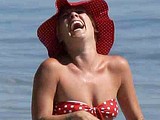 Pink flashing perfect body on a beach