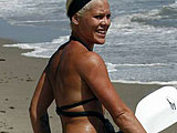 Pop singer Pink caught in a black bikini in the sea on the kayak