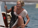 Sharon Stone flashing panties on a boat