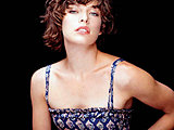 Milla Jovovich shows sexy legs and glamour photo shoots gallery