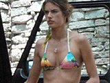 Alessandra Ambrosio caught in tiny bikini cleaning out her car