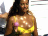 Beyonce Knowles drinking cocktail in a sexy yellow bikini in the yacht
