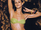 Carmen Kass showing her perky tits tanning nude in the solarium