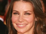 Evangeline Lilly hot kissing on a beach