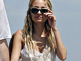 Nicole Richie showing her great legs on the beach sexy candids