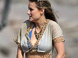 Leelee Sobieski showing some legs and deep cleavage on a Malibu beach
