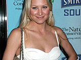 Anna Kournikova looks so sweet showing her graceful long legs in skirt