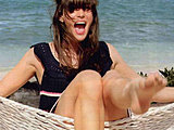 Liv Tyler flaunting her hot legs posing in sexy dresses on the beach