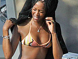 Naomi Campbell caught in a wet bikini on the yacht after swiming