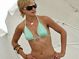 Mena Suvari showing her sexy ass sunbathing in a tiny thong bikini