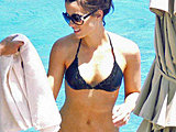 Kate Beckinsale showing her hot body suntanning in a tiny bikini