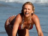 Charlize Theron showing her nice tits and upskirt
