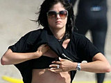 Selma Blair looks so hot in a black bikini bottom on the beach