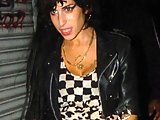 Amy Winehouse nipple slip and bush oops pics