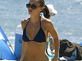 Christina Ricci have nice time in a tiny black bikini on the beach