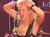 Courtney Love go topless during concert