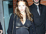 Jessica Alba flaunting her big post-pregnancy boobs and deep cleavage