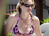 Julia Roberts looks gorgeous in a tiny bikini poolside candids