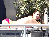 Liv Tyler caught sunbathing in bikini & topless