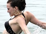 Hilary Duff in a tiny two piece black bikini