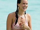 Joss Stone all wet and sexy bathing in a tiny bikini with boyfriend