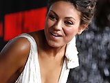 Mila Kunis flaunting her tits in sexy cleavage