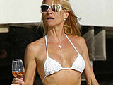 Nicollette Sheridan shows her tight body in tiny bikini on the beach