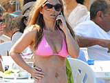 Geri Halliwell shows sweet ass and boobies in a sexy pink bikini