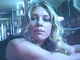 Peta Wilson flashes pussy while strips in lingerie