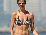 Brooke Burns looking nice caught in a little bikini on the beach