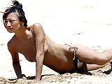 Bai Ling topless oops shots on beach & bikini